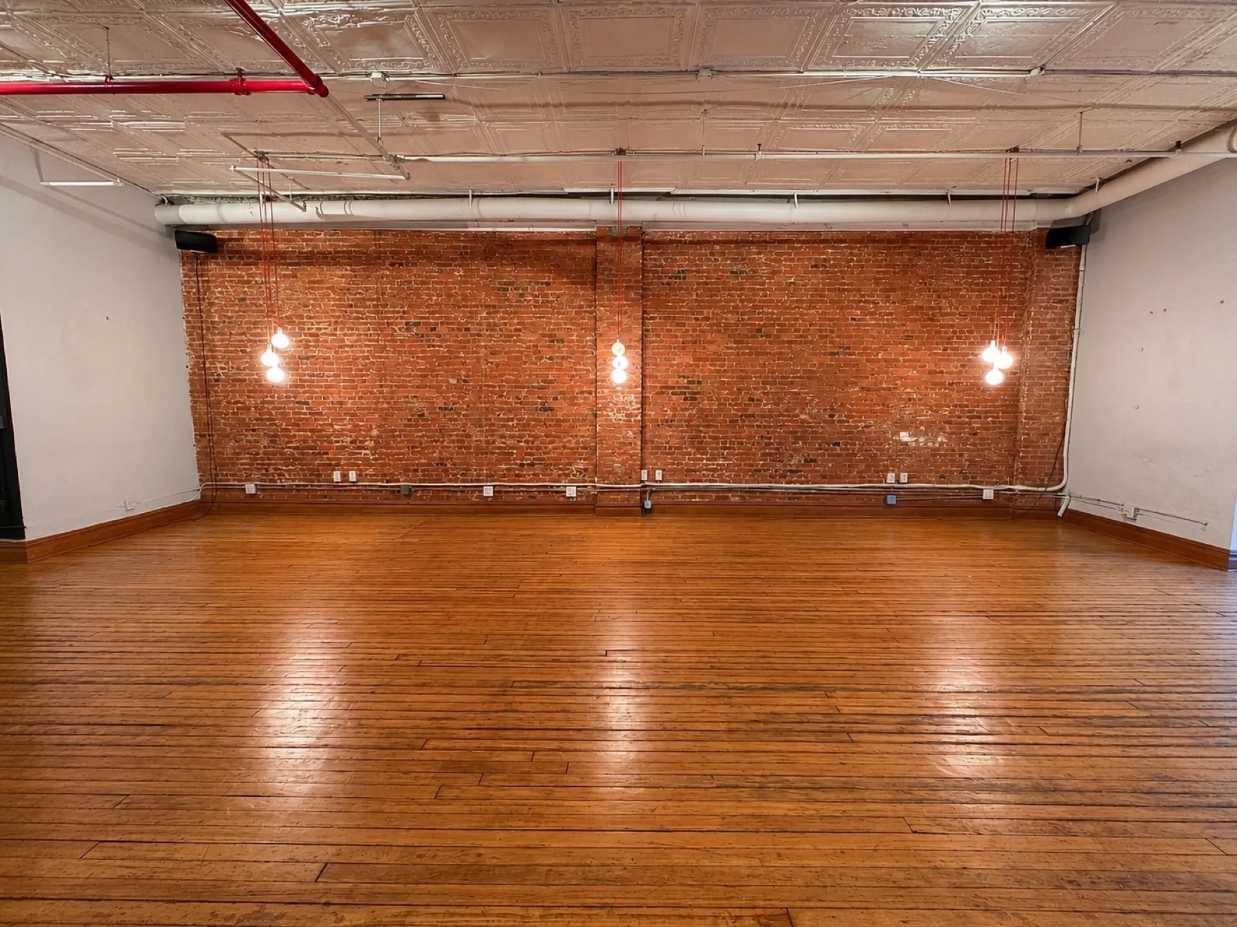 Cast iron loft with brick walls and tin ceiling