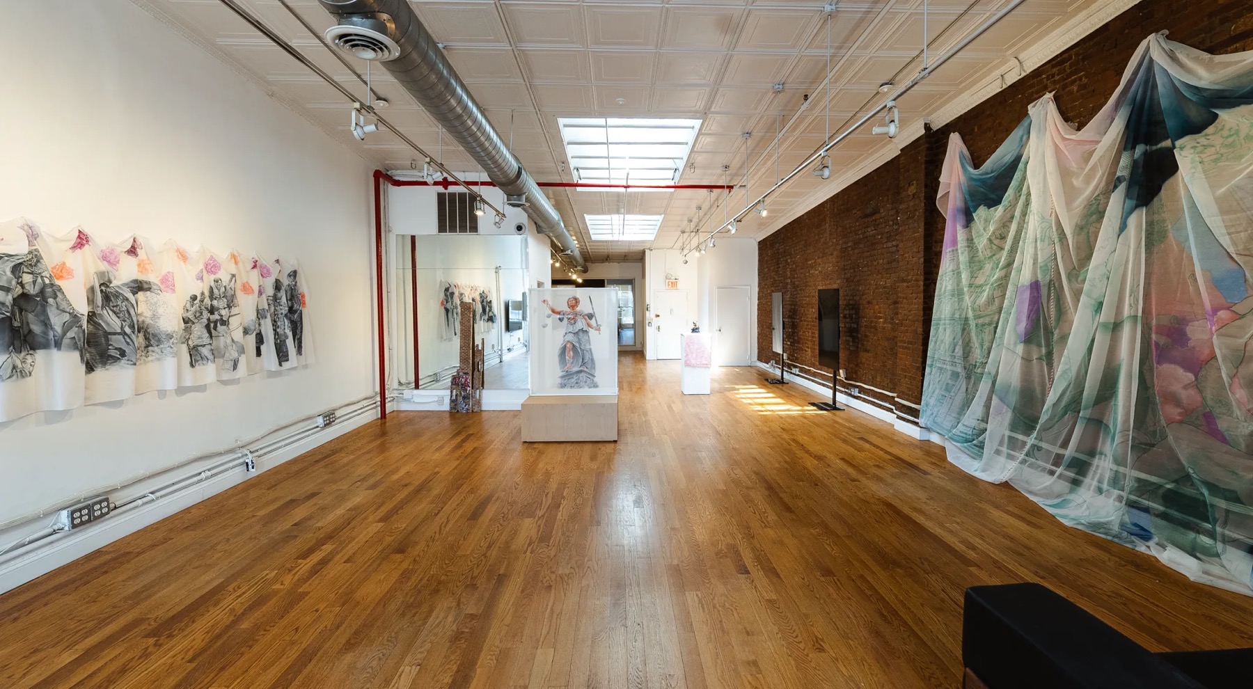 Art installation in the white-walled gallery loft