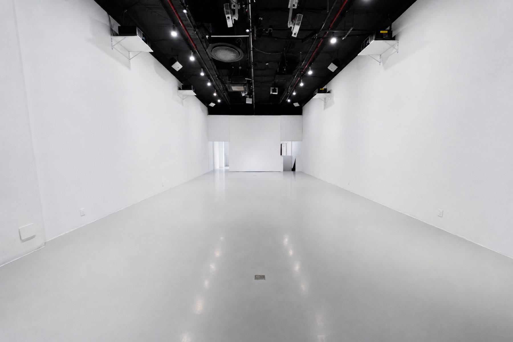 The White Box Stage as a blank white room before load-in